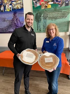 Chronic Pain West Des Moines IA Josiah Fitzsimmons Handing Out Pies