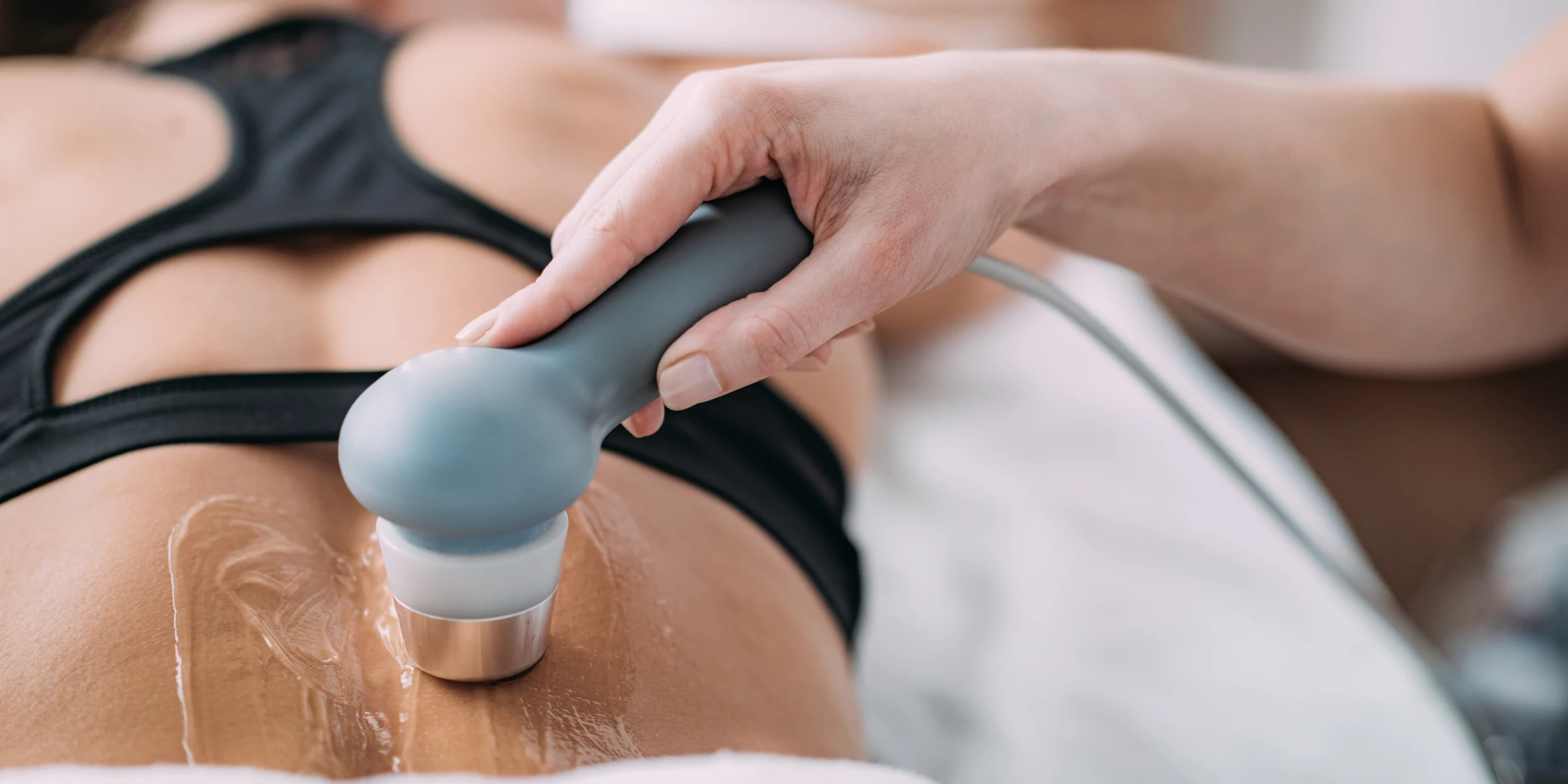 Woman Receiving Shockwave Therapy